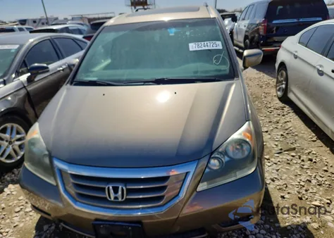 2010 Honda Odyssey Exl z USA, uszkodzony, nr VIN 5FNRL3H74AB076003